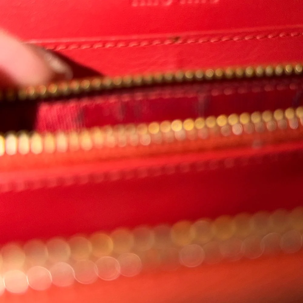 Miu Miu Bright Orange Leather Clutch
